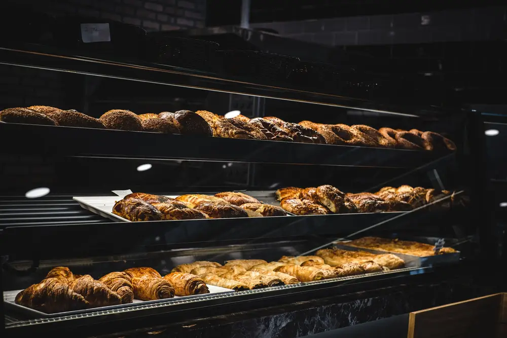 Pastry case filled with breads and pastries